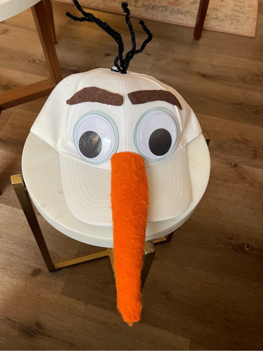 Frozen’s Olaf DIY Hat with Orange Nose and Googly Eyes